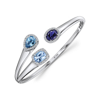 Браслет жесткий с топазом, бриллиантами, иолитом и цирконом - фото 1 Браслет жесткий с топазом, бриллиантами, иолитом и цирконом - фото 1