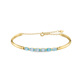 Браслет жесткий с топазами